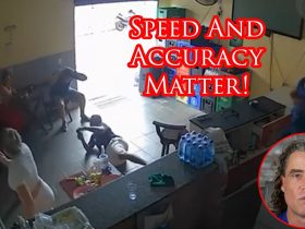 Armed Defender Waits His Turn To Take Armed Robber Down