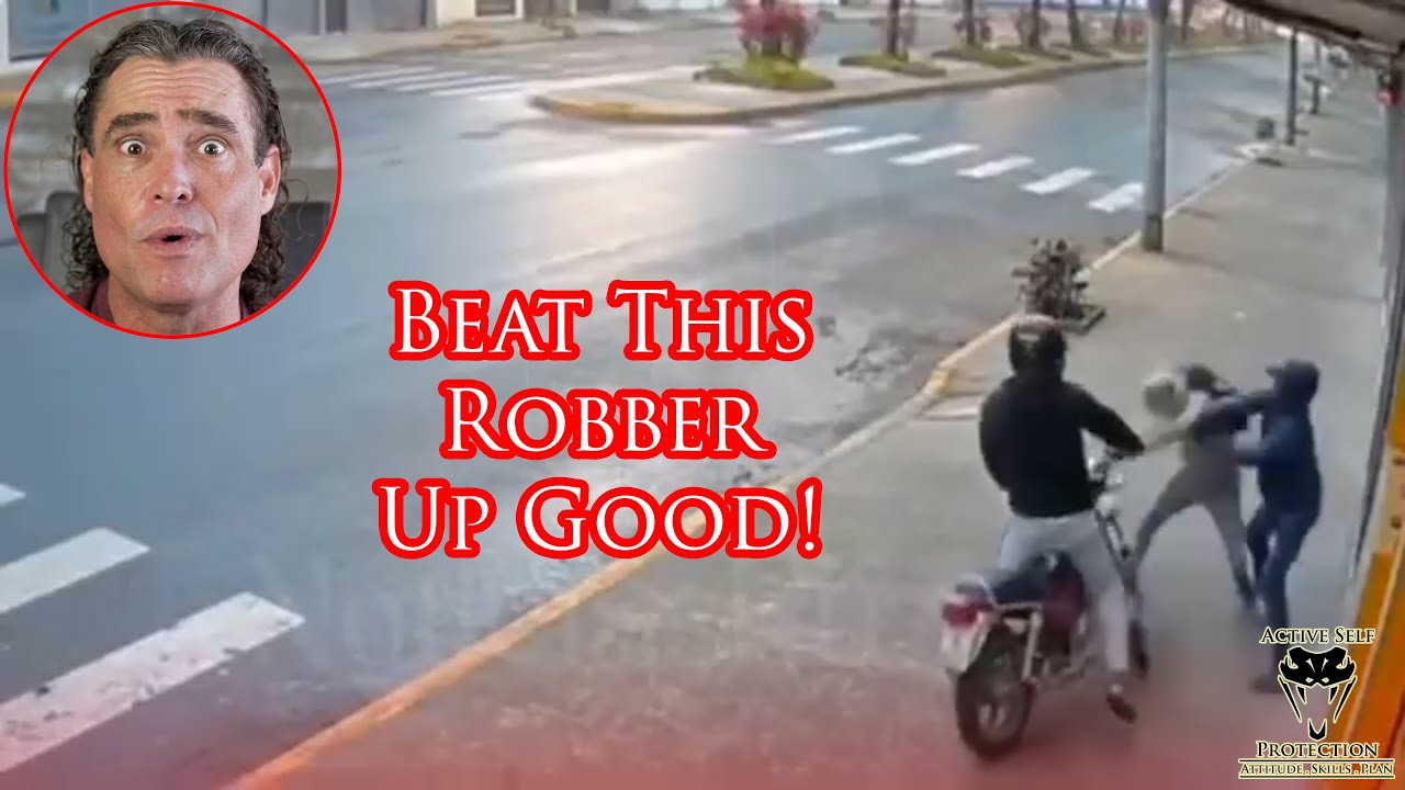 Amazing Defender Puts a Beating on Surprised Robber