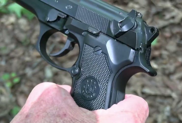 Beretta 92 FS Suppressed Close-up